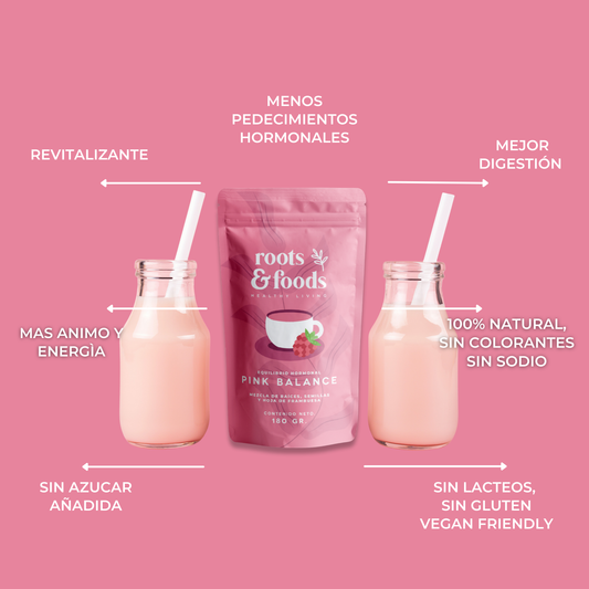 dos vasos servidos y paquete Pink Balance Roots & Foods sobre fondo rosa pastel, mencionando los beneficios como: menos padecimientos hormonales, mejor digestión, revitalizante, mas animo y energía, vegan friendly.